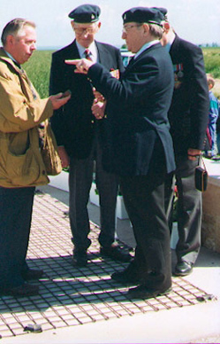A local farmer asking former 197 Sqn members about one of many cartridge cases he had found on his land. They were the cases of starter cartridges used to start up the Typhoon's Napier Sabre engine. L to R: farmer, David Ince, Derek Lovell, Alex Shannon. Photo: Derek Lovell